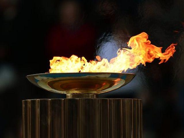 Росії передали вогонь зимових Олімпійських ігор Росії передали вогонь зимових Олімпійських ігор