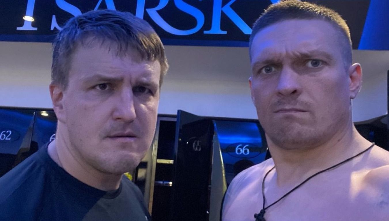 Александр Усик со своим промоутером Александр Усик со своим промоутером